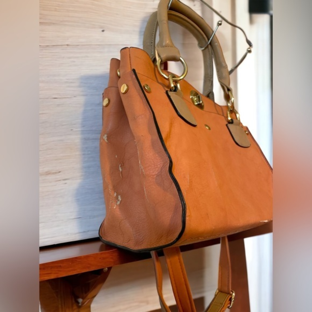 leather purse, nice & soft leather,‎ light tan.
